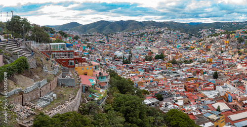 Aerial: panoramic view of the landscape and cityscape in Guanajuato, Mexico. Drone view 