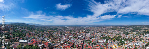 Aerial: scenic cityscape and landscape in San Miguel de Allende, Mexico. Drone view