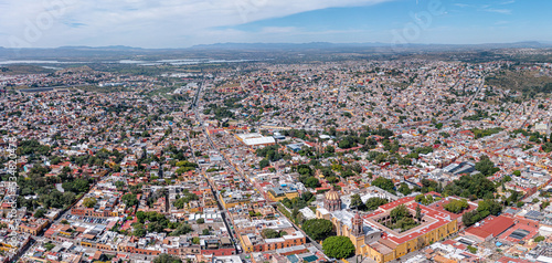 Aerial: beautiful cityscape and landscape in San Miguel de Allende, Mexico. Drone view 