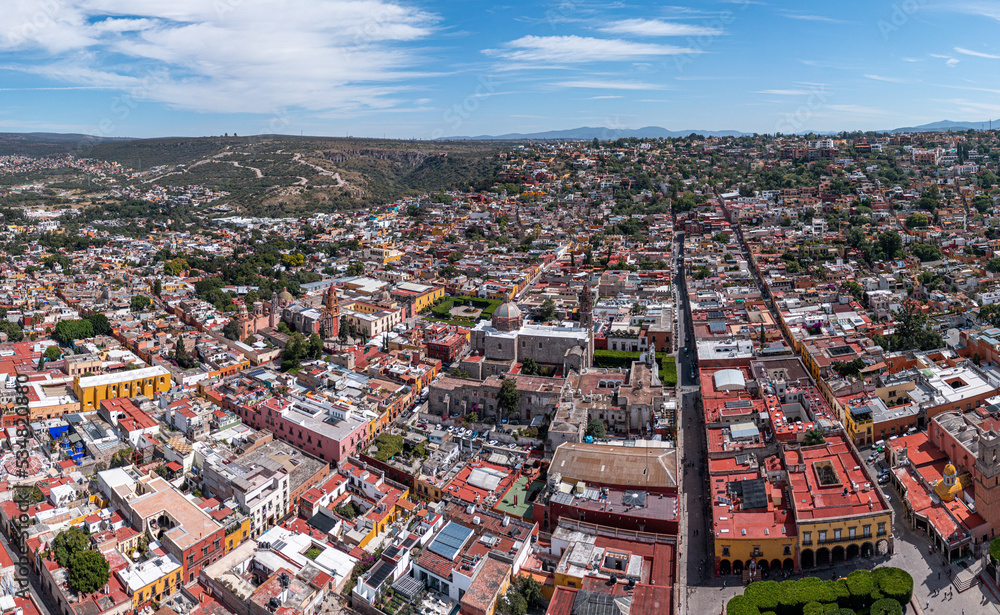Aerial: pretty cityscape and landscape in San Miguel de Allende. Drone view
