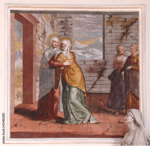 Maria incontra Elisabetta. Affresco nella Chiesa parrocchiale di Civezzano in Valsugana (Trentino) photo