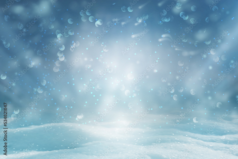 Winter Christmas background with magic Bokeh lights. Blue snowscape.