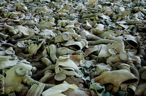 Ggas masks on the floor of Prypiat school, Chernobyl exclusion zone, Ukraine photo