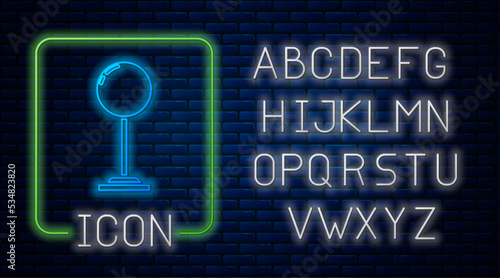 Glowing neon Floor lamp icon isolated on brick wall background. Neon light alphabet. Vector