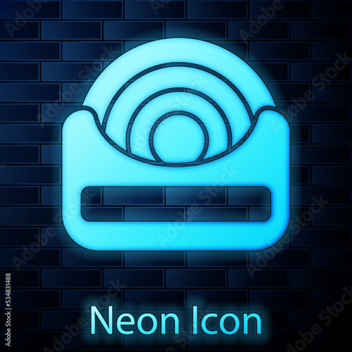 Glowing neon Dental floss icon isolated on brick wall background. Vector