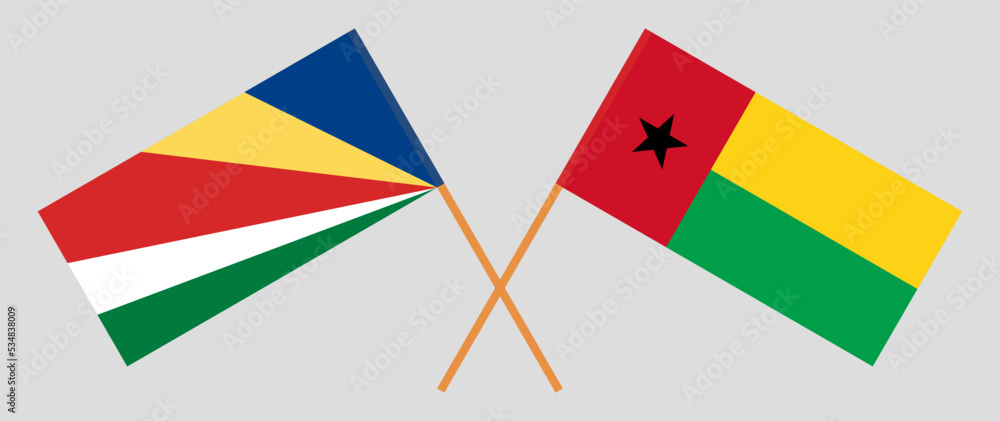 Fototapeta premium Crossed flags of Seychelles and Guinea-Bissau. Official colors. Correct proportion