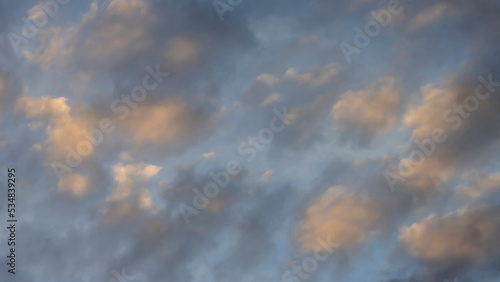 Clouds at sunset, scenic textured background