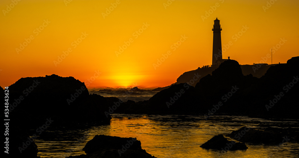Beautiful sunset at the state beach and the lighthouse 
