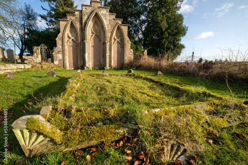 Kincardine Graveyard. St Lolan's Church And Burial Ground. County Stirling. Scotland. U.K. Site of former parish church. Contains two burial enclosures, both with fine armorial panels of 1699 photo