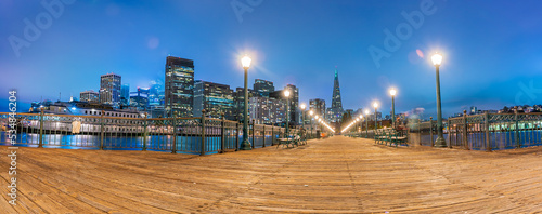 Scenic view of the pier and downtown of San Francisco, California at night 

