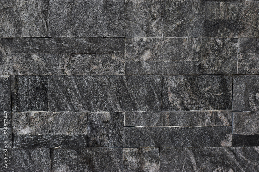 dark gray stone pattern wall. black slate wall background