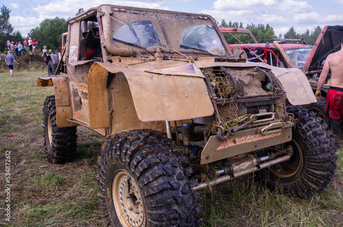 Exhibition of cars - titans, participants of the race. Large-scale sports competitions of off-road cars "TVER KNEADING: RACE OF TITANS" in the "Pavlov Adventure Park" in Tver. August 12, 2022.