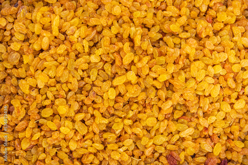 Trade counter with ripe existing grapes (raisins). Textured surface. Autumn agricultural fair. Trade counter with ripe existing grapes (raisins). Textured surface. Autumn agricultural fair.