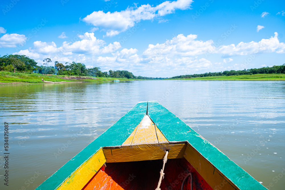boat trip throught amazonian river in peru