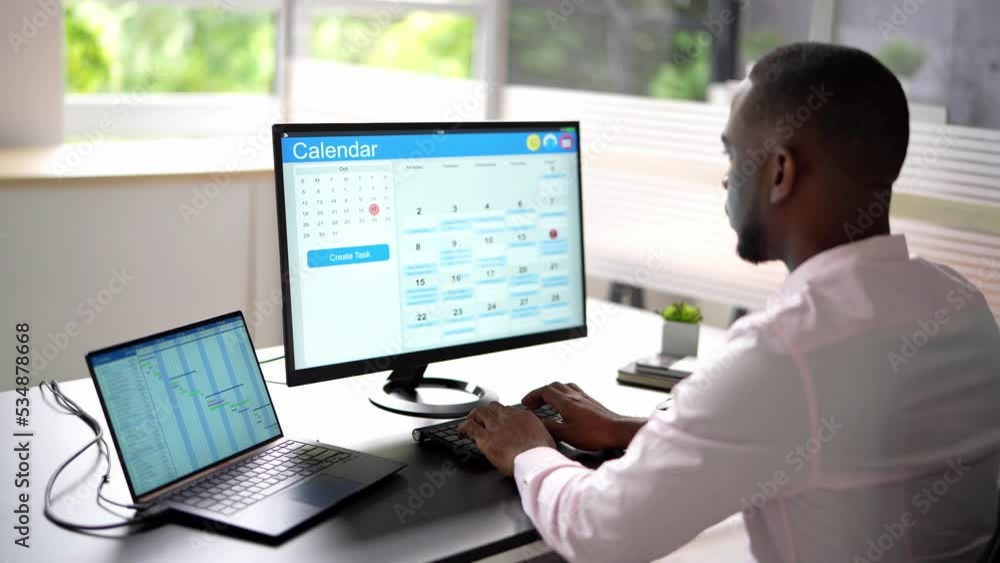 Man Working On Calendar Agenda Schedule Man Working On Calendar Agenda Schedule