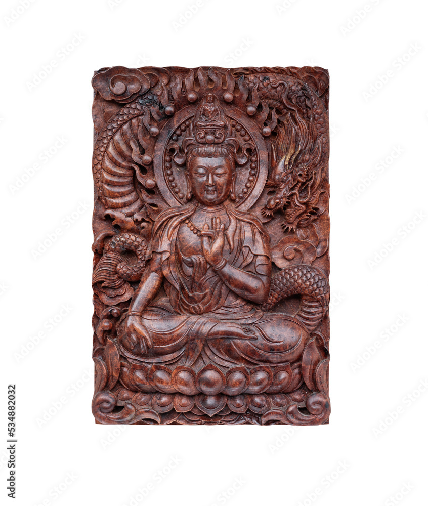 Hand carved teak wood of Guan Yin Bodhisattva or Quan yin buddha (Goddess of mercy) isolated on white background with clipping path. Selective focus.