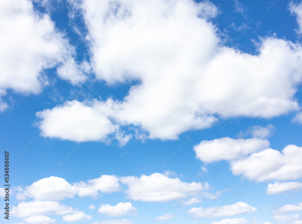 Fototapeta premium White clouds against the blue sky.