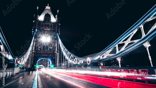 Fototapeta Naklejka Na Ścianę i Meble -  The Tower Bridge by night. Blurred car lights. 