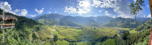 Fototapeta Naklejka Na Ścianę i Meble -  Beautiful panorama view point of rice fields on terraced of Tu Le in Vietnam with white clouds in blue sky. Vietnam landscape.
