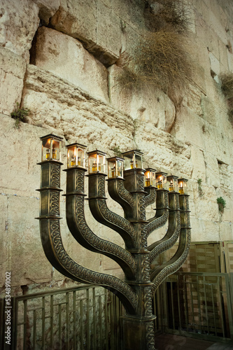 The official Hanukkah menorah of the Western Wall in Jerusalem, alight with all eight candles burning on the final night of the eight-day festival. photo