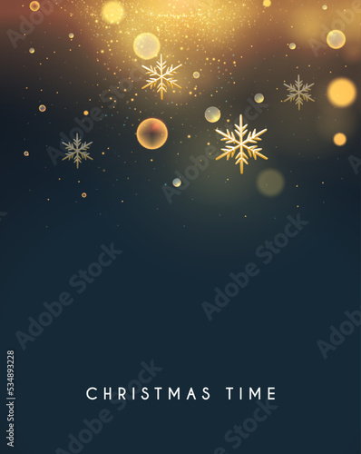 Christmas bokeh light effect with gold sowflakes.