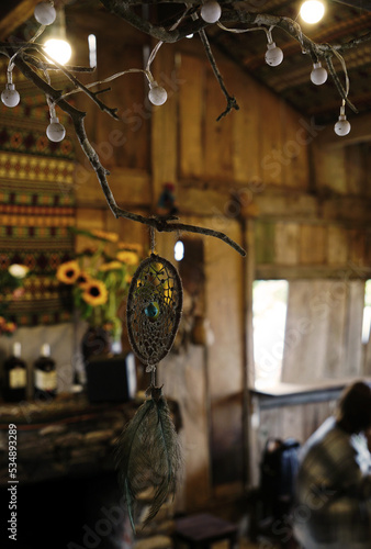 Dreamcatcher hanging in a antique coffee shop background in Ta Xua, Vietnam