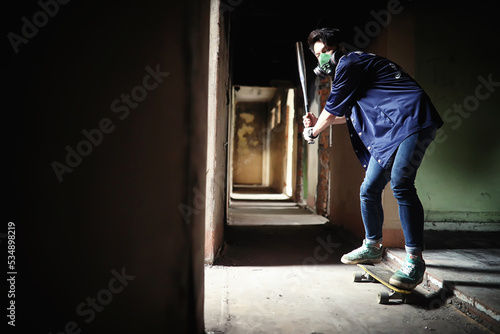 A young person with a baseball bat