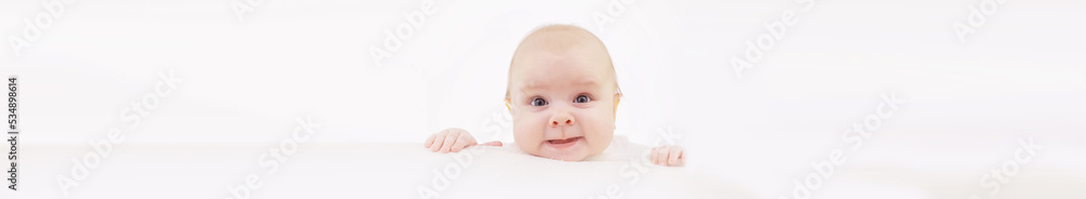 Baby and emotions. Little baby and place for text. Long poster. Baby and emotions. Little baby and place for text. Long poster.