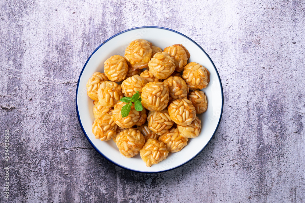 Pine nut penelles. Traditional autumn recipe for desserts made with marzipan in Barcelona Pine nut penelles. Traditional autumn recipe for desserts made with marzipan in Barcelona