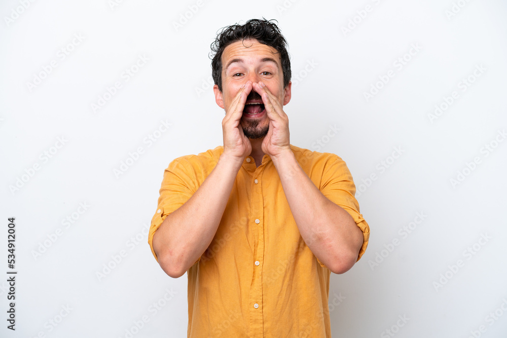 Young man with moustache isolated on white background shouting and announcing something Young man with moustache isolated on white background shouting and announcing something