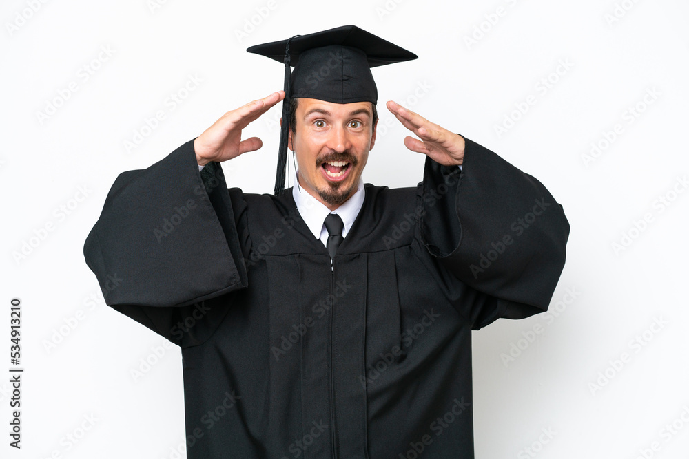 Young university graduate man isolated on white background with surprise expression Young university graduate man isolated on white background with surprise expression