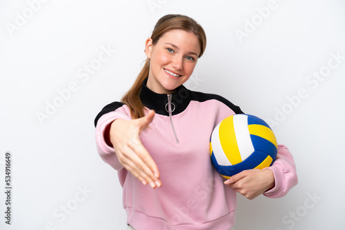 Young caucasian woman playing volleyball isolated on white background shaking hands for closing a good deal