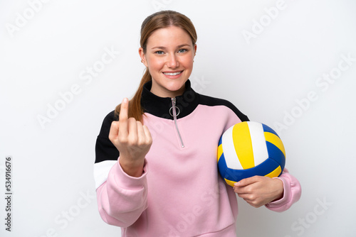 Young caucasian woman playing volleyball isolated on white background doing coming gesture