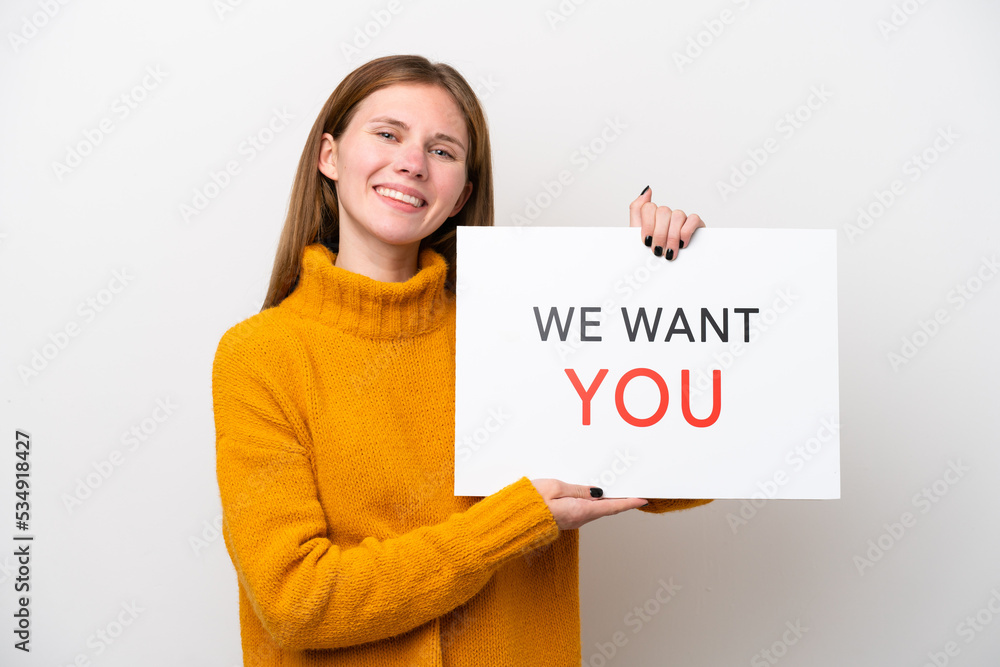Young English woman isolated on white background holding We Want You board with happy expression Young English woman isolated on white background holding We Want You board with happy expression