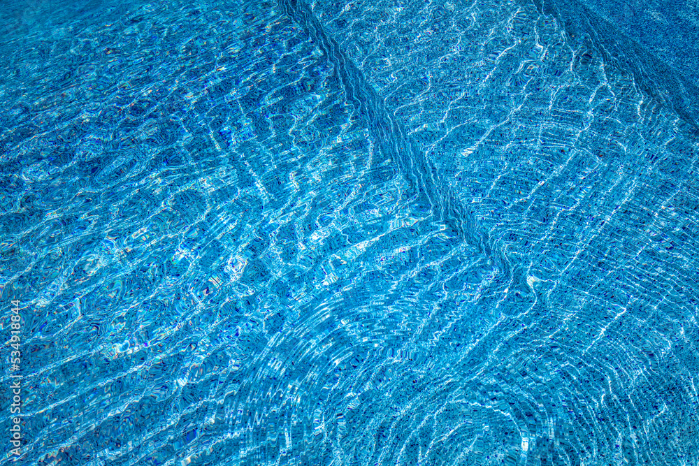 Swimming pool water sunny reflection background. Ripple poolside water ...