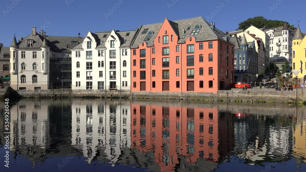 Cruise to Norway. Sunny morning in Alesund. Popular tourist destination in Norway. Colorful scene of the Nord. Traveling concept. Cruise to Norway. Sunny morning in Alesund. Popular tourist destination in Norway. Colorful scene of the Nord. Traveling concept.