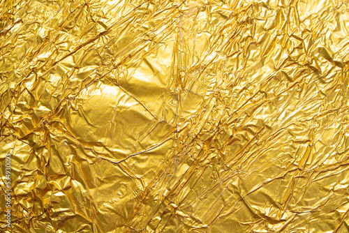 Wrinkled gold metallic foil texture