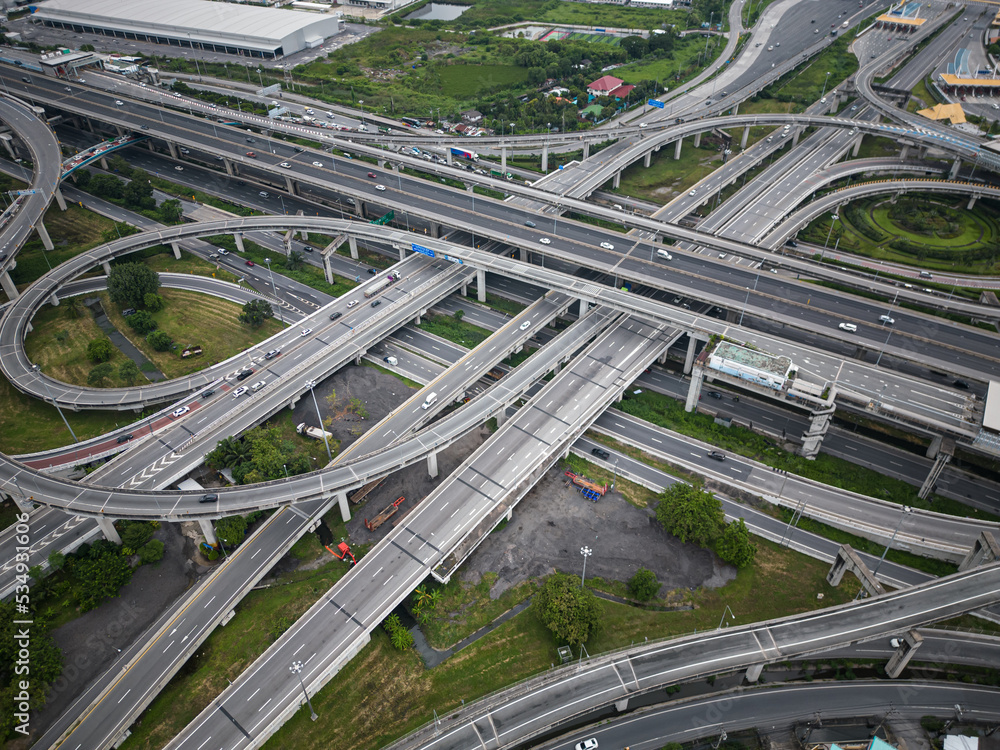 Naklejka premium Aerial view city junction cross road with vehicle