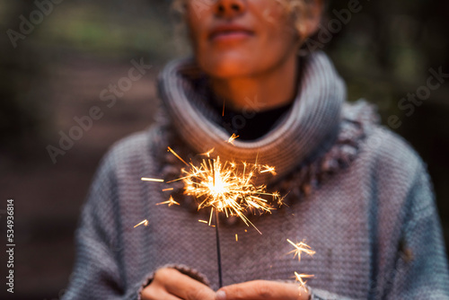 Photography Close up of woman people holding sparkler and celebrate outdoor