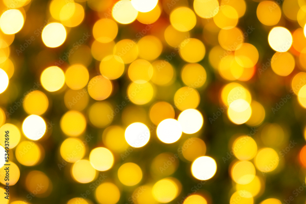 Obraz premium abstract light blur golden yellow bokeh background christmas