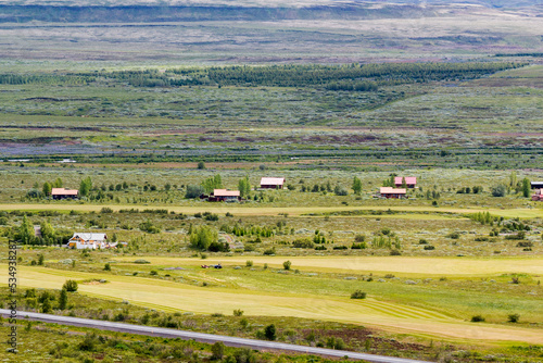 birds eye view over the valley of Bláskógabyggð with tiny wooden houses, Iceland