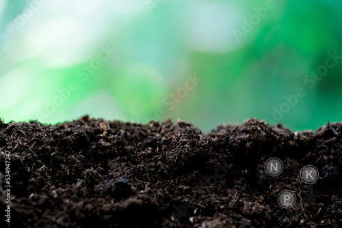 Loamy soil that is rich and has iconic technology about soil nutrients that are essential to cultivation. photo