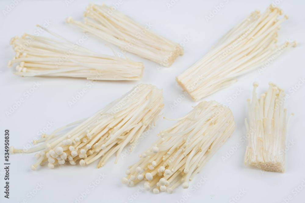 Enoki mushroom, Golden needle mushroom on white background Enoki mushroom, Golden needle mushroom on white background
