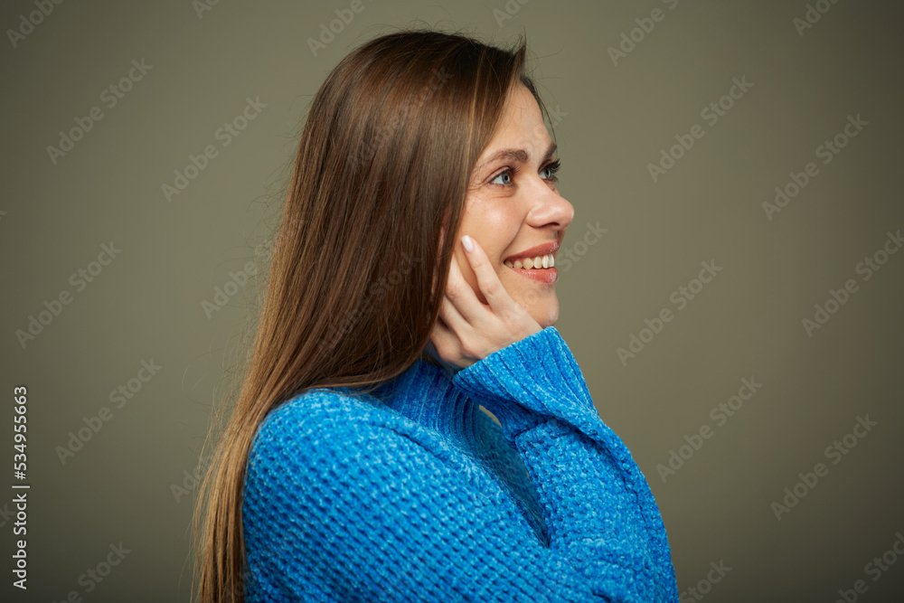Profile portrait of woman with real natural skin, touching her face. Profile portrait of woman with real natural skin, touching her face.