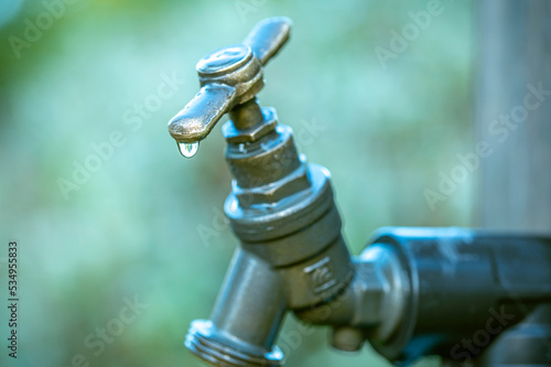 A small water tap in the garden