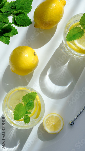 Drink limonade glasses with lemon slices. Flat lay (ID: 534956083)