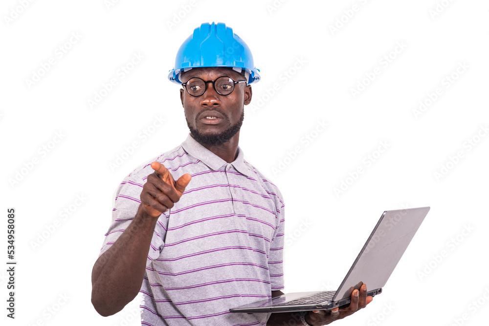 young man engineer holding laptop and pointing finger forward. young man engineer holding laptop and pointing finger forward.