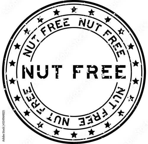 Grunge black nut free word with star icon round rubber seal stamp on white background