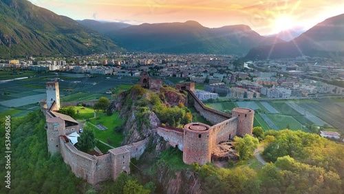 Bolzano italy skyline aerial view drone footage in 4k, bozen city europe castle viewe and old town. photo