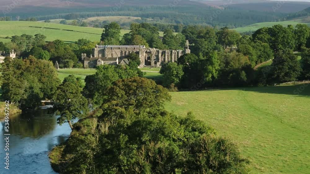 Early morning sunshine illuminates Bolton Abbey in Wharfedale, North Yorkshire, England, takes its name from the ruins of the 12th-century Augustinian monastery now known as Bolton Priory Early morning sunshine illuminates Bolton Abbey in Wharfedale, North Yorkshire, England, takes its name from the ruins of the 12th-century Augustinian monastery now known as Bolton Priory